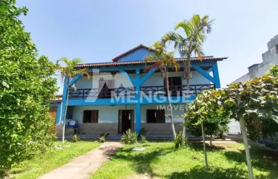Casa com 4 quartos à venda na campanha, 15, jardim itu sabará, porto alegre por r$ 1.950.000