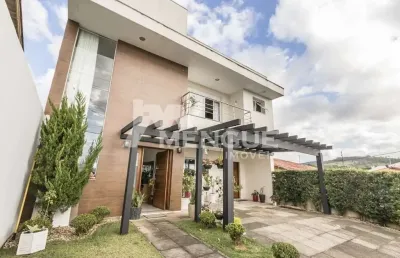 Casa em condomínio fechado com 3 quartos à venda na rua erny ludwig, 215, mário quintana, porto alegre por r$ 830.000