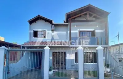 Casa com 4 quartos à venda na rua corrêa de mello, 1060, sarandi, porto alegre por r$ 795.000