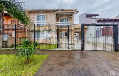 Casa com 3 quartos à venda na rua maria elaine wotter, 46, parque santa fé, porto alegre por r$ 749.000