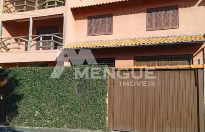Casa com 7 quartos à venda na rua tuparaí, 21, passo da areia, porto alegre por r$ 1.450.000