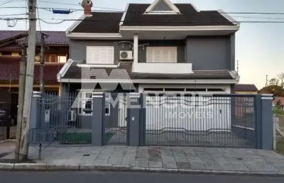 Casa com 3 quartos à venda na rua hugo nelson magalhães, 280, parque santa fé, porto alegre por r$ 958.000
