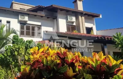 Casa com 4 quartos à venda na rua arnaldo ballve, 709, jardim itu sabará, porto alegre por r$ 1.080.000