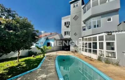 Casa com 4 quartos à venda na rua doutor joão césar krieger, 130, parque santa fé, porto alegre por r$ 1.100.000