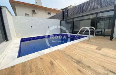 Casa sobreposta alta com 3 suítes e 2 vagas com piscina e churrasqueira no embaré em santos nova