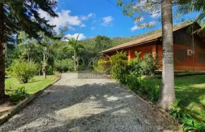 Lindo sitio com área de 40 mil metros, de frente para o asfalto,, localizado na estrada geral do braço em camboriú!
