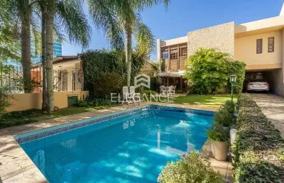 Elegance imóveis vende casa, 400m, 3 dormitórios, 1 suíte, living de 3 ambientes, pátio com piscina e 4 vagas de garagem/box. comprar r$ 2.790.000,00