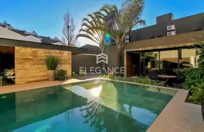 Elegance imóveis vende casa de cinema, 400m, 3 dormitórios, 3 suítes, churrasqueira, piscina aquecida, 6 vagas de garagem/box. comprar r$ 4.989.000,00