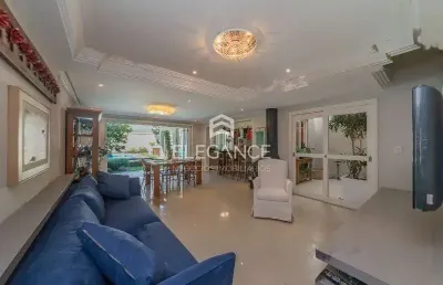 Elegance imóveis vende casa desocupada 4 dormitórios suíte lareira quintal piscina. 3 vagas box/garagem três figueiras porto alegre. r$ 1.800.000,00