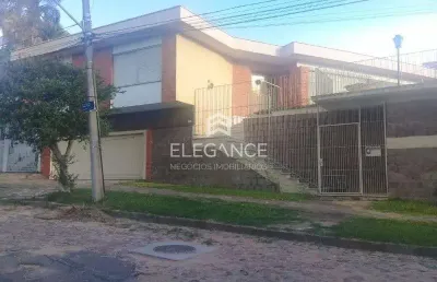 Casa com 4 quartos à venda na rua doutor jorge fayet, 491, chácara das pedras, porto alegre, 300 m2 por r$ 1.450.000