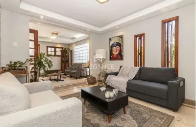 Casa com 4 quartos à venda na rua professor fernando carneiro, 112, três figueiras, porto alegre por r$ 1.500.000