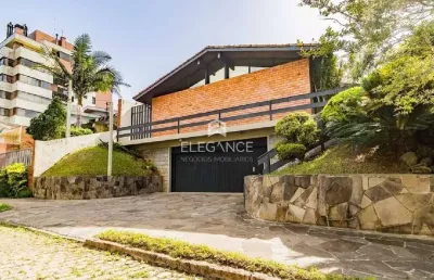 Casa com 4 quartos à venda na travessa java, 76, jardim lindóia, porto alegre por r$ 1.095.000
