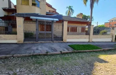 Casa com 4 quartos à venda na rua paissandu, 361, partenon, porto alegre por r$ 2.900.000