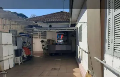 Excelente terreno com 400  m2 ,  bairro paraíso,  240 m² a.c  ,  com 2 casas , mais  1 edícula, area de serviço, depósito  e 2 vagas cobertas. analisa permutas.  ref: 19.416