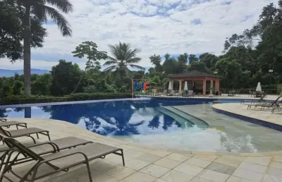 Excelente casa cond. fechado praia do curral,  60m² a.c., 2 dormitórios (2 suítes), sala,  varanda, 1 vaga, lazer (ref 20.630)