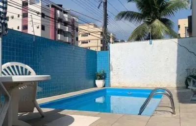 Sobrado com 2 dormitórios para alugar, 70 m² por r$ 2.600,00/mês - astúrias - guarujá/sp