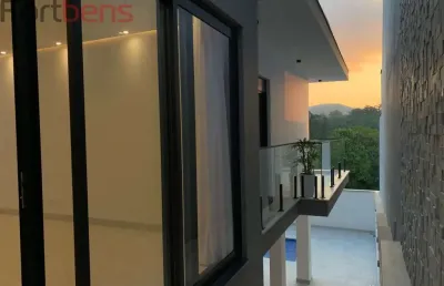 Casa de condomínio para vender com 4 quartos 3 suítes no bairro nova caieiras em caieiras
