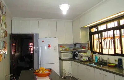 Casa terreá para venda no jardim brasil, com 3 dormitórios (1 suíte) e 2 vagas de garagem