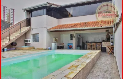 Casa com 4 quartos à venda na Rua Rubens Gonçalves de Freitas, Tupi, Praia Grande