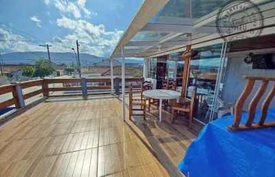 Sobrado com 3 dormitórios à venda, 142 m² por r$ 690.000,00 - maracanã - praia grande/sp