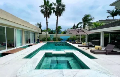 Casa à venda no condomínio jardim acapulco no guarujá | omega imóveis