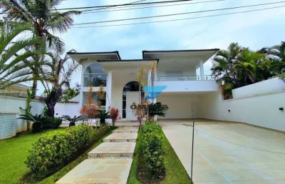 Casa à venda no condomínio jardim acapulco no guarujá | omega imóveis