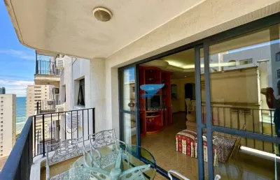 Apartamento com vista parcial para o mar à venda na praia das pitangueiras no guarujá/ omega imoveis