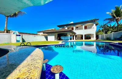 Casa reformada com 5 suítes à venda no jd. acapulco em guarujá.