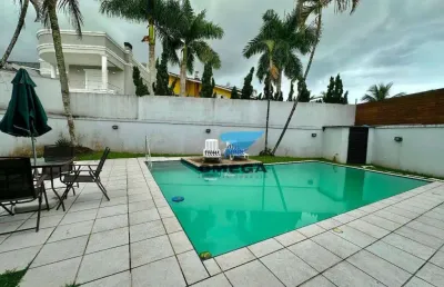 Casa à venda em condomínio de alto padrão no guarujá | omega imóveis