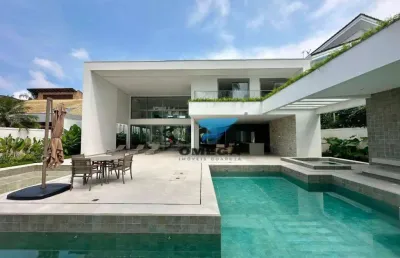 Casa de alto padrão com 7 suítes à venda em condomínio jardim acapulco - guarujá/sp. confira!