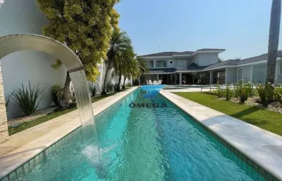 Casa à venda no condomínio jardim acapulco no guarujá | omega imóveis