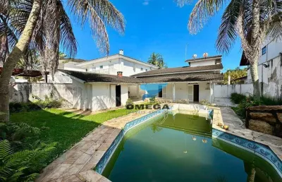 Casa à venda no jardim acapulco no guarujá | omega imóveis