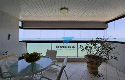 Apartamento reformado vista mar à venda na praia das pitangueiras no guarujá i omega imoveis
