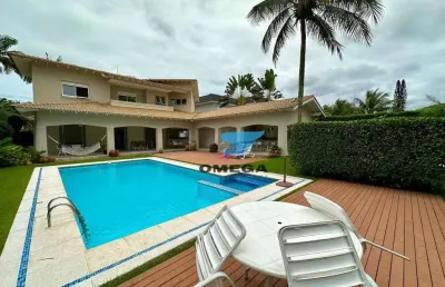 Casa à venda em condomínio jardim acapulco no guarujá | omega imóveis