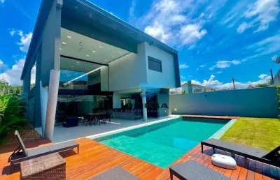 Casa à venda em condomínio jardim acapulco no guarujá | omega imóveis