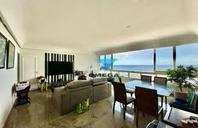 Apartamento reformado frente mar à venda na praia das pitangueiras no guarujá i omega imoveis