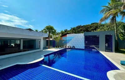 Casa nova à venda no condomínio jardim acapulco no guarujá | omega imóveis