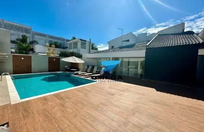 Casa à venda no condomínio jardim acapulco no guarujá | omega imóveis