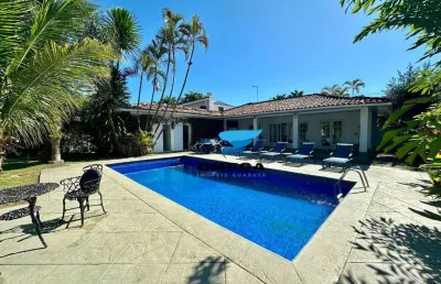 Casa à venda em condomínio jardim acapulco no guarujá | omega imóveis