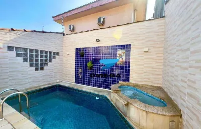 Sobrado reformado com piscina e churrasqueira à venda no guarujá i omega imoveis