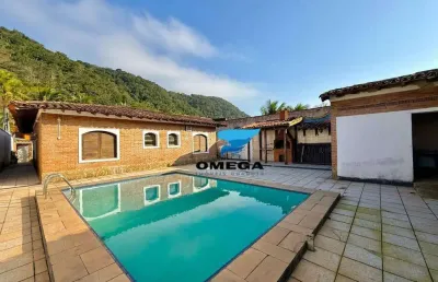 Casa com 4 quartos à venda na Rua Gerônimo Lopes Agria, 523, Jardim Guaiuba, Guarujá