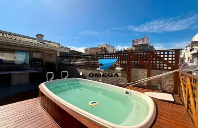 Cobertura penthouse com vista mar á venda na praia das pitangueiras no guarujá i omega imoveis