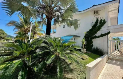 Casa à venda no condomínio jardim acapulco no guarujá | omega imóveis