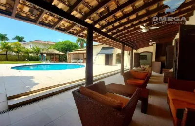 Casa à venda no condomínio jardim acapulco no guarujá | omega imóveis