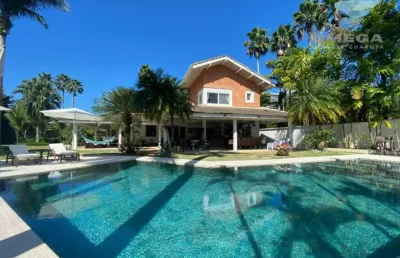 Casa à venda no condomínio jardim acapulco no guarujá | omega imóveis