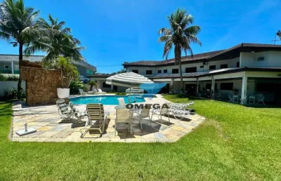 Casa à venda no condomínio jardim acapulco no guarujá | omega imóveis