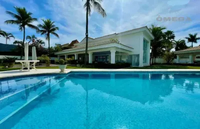 Casa à venda no condomínio jardim acapulco no guarujá | omega imóveis