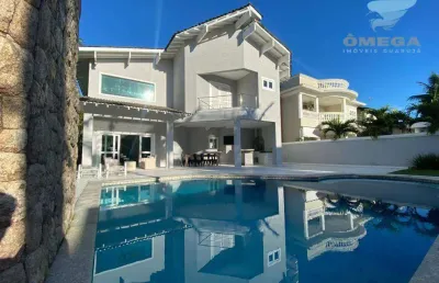 Casa à venda no condomínio jardim acapulco no guarujá | omega imóveis
