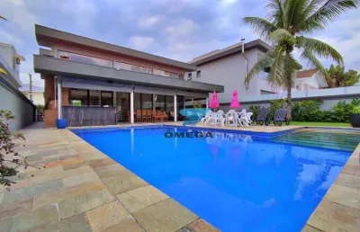 Casa à venda no condomínio jardim acapulco no guarujá | omega imóveis
