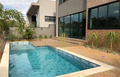 Sobrado com 4 suítes com piscina integrada na área de lazer no alphaville